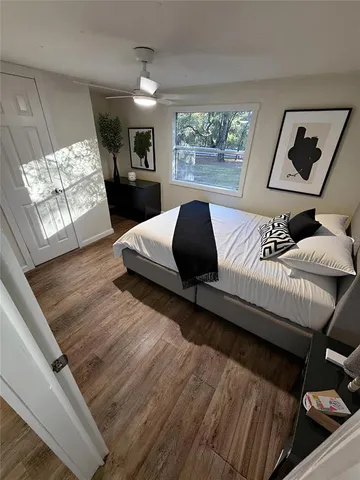 a room with furniture and wooden floor