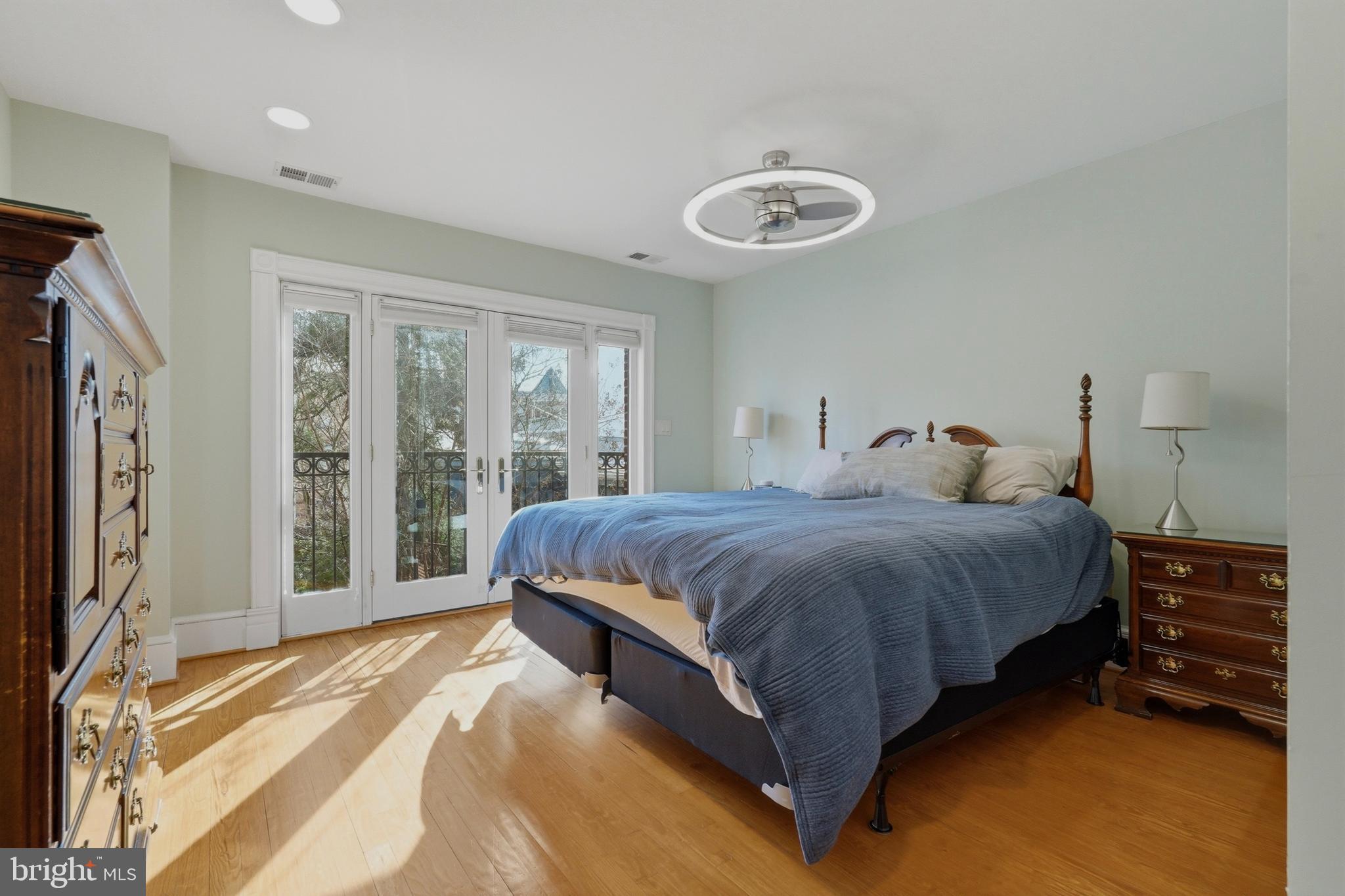 1002 N Street Northwest Washington, DC 20001 - Photo 21 of 33 a spacious bedroom with a bed and a large window
