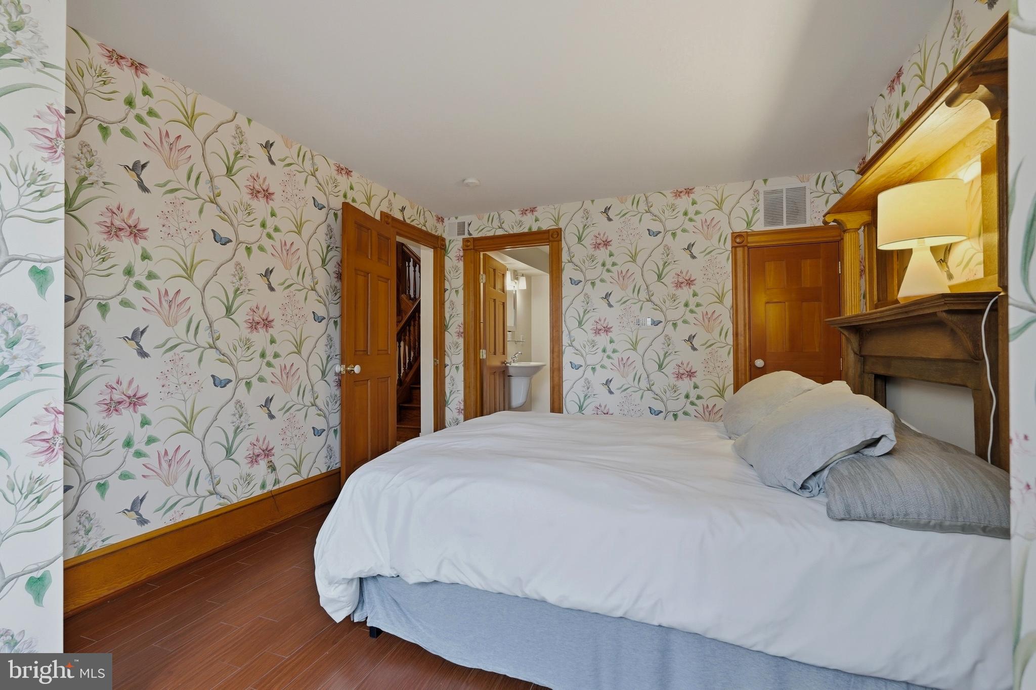 1002 N Street Northwest Washington, DC 20001 - Photo 26 of 33 a bedroom with a bed and a flat screen tv