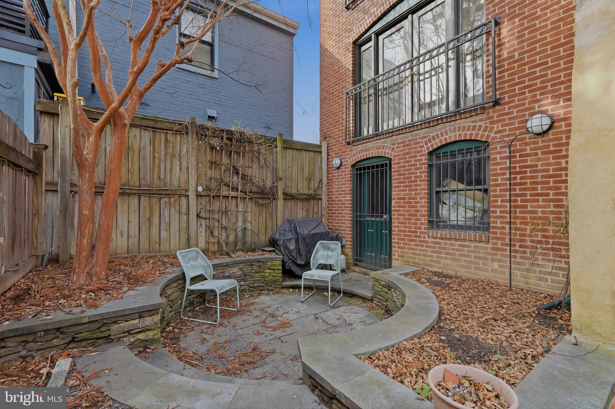 1002 N Street Northwest Washington, DC 20001 - Photo 31 of 33 a view of a brick building with many windows