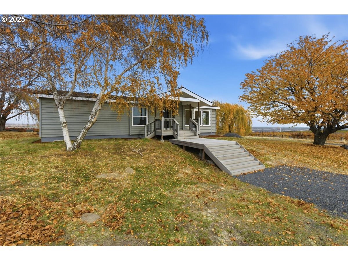 499 Alderdale Road Prosser, WA 99350 - Photo 2 of 41 a view of a house with a yard