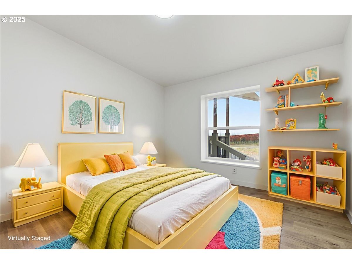 499 Alderdale Road Prosser, WA 99350 - Photo 26 of 41 a bedroom with a bed and cabinets