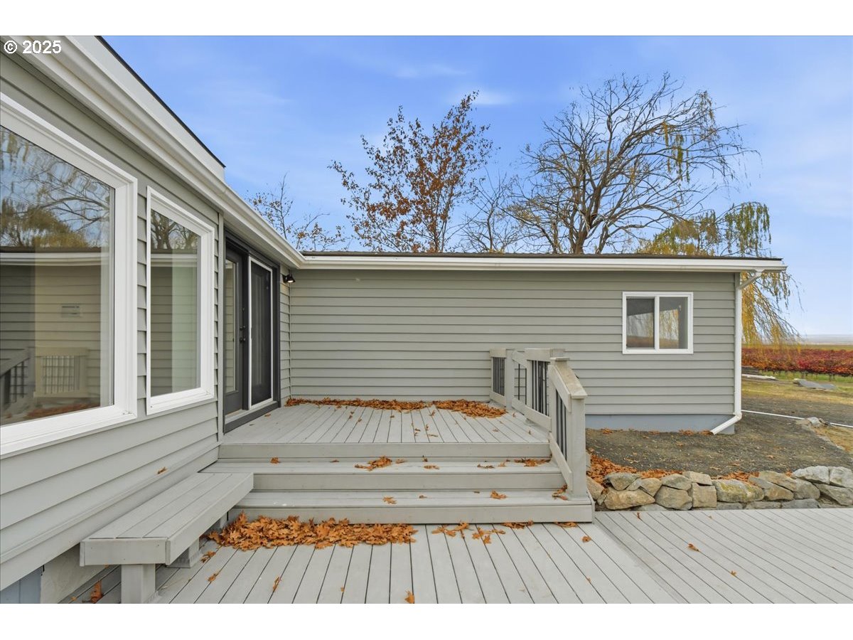 499 Alderdale Road Prosser, WA 99350 - Photo 31 of 41 a view of a house with a door and wooden floor