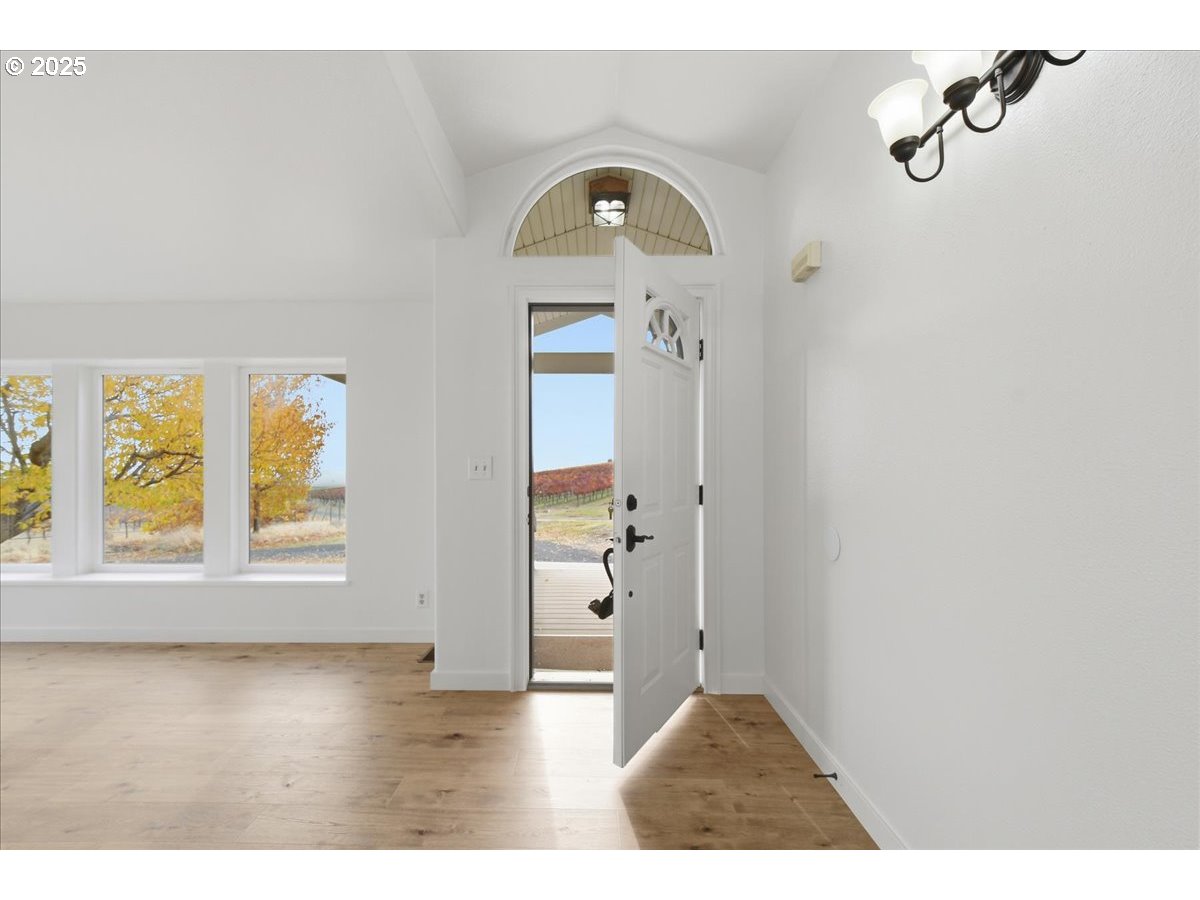 499 Alderdale Road Prosser, WA 99350 - Photo 5 of 41 a view of empty room with windows