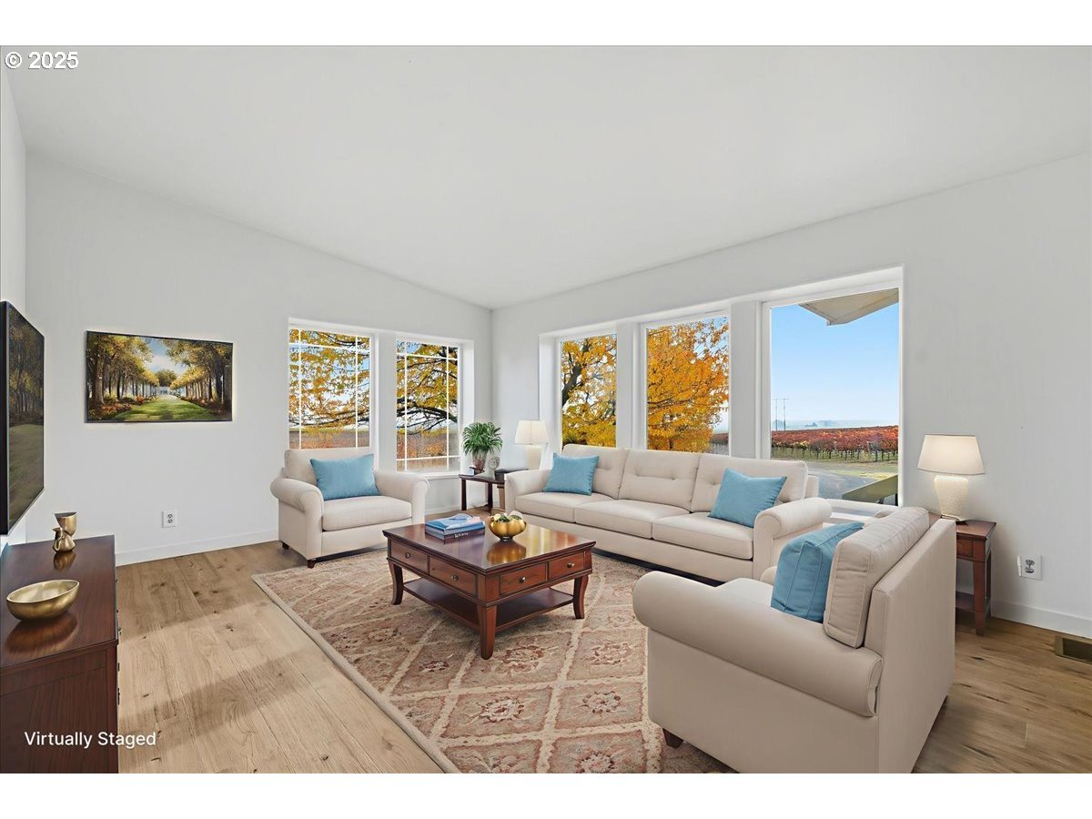 499 Alderdale Road Prosser, WA 99350 - Photo 6 of 41 a living room with furniture and a large window