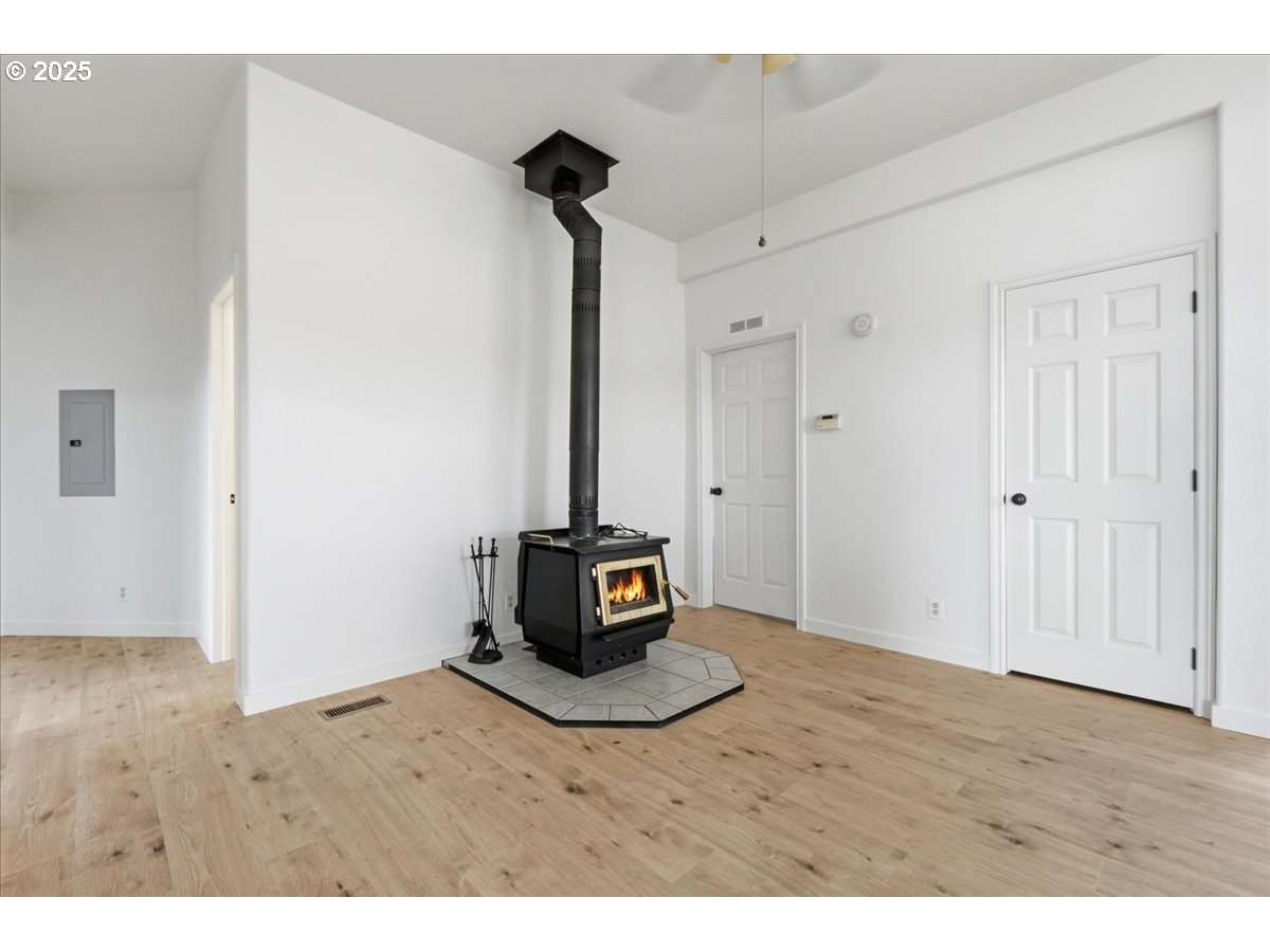 499 Alderdale Road Prosser, WA 99350 - Photo 8 of 41 a living room with a wooden floor