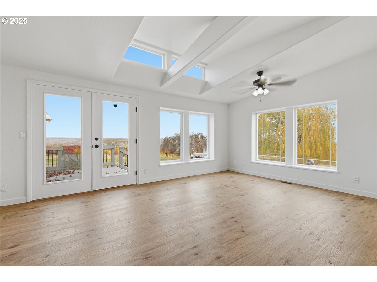 499 Alderdale Road Prosser, WA 99350 - Photo 10 of 41 a view of an empty room with a window