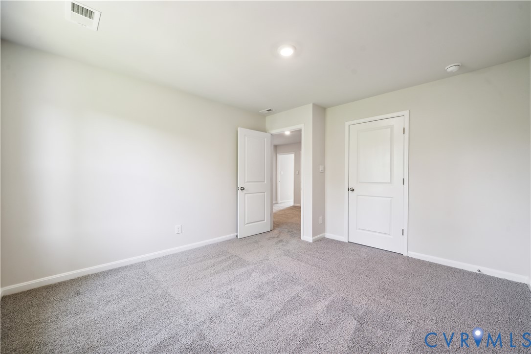 9529 Fuchsia Drive Richmond, VA 23237 - Photo 20 of 28 a view of an empty room