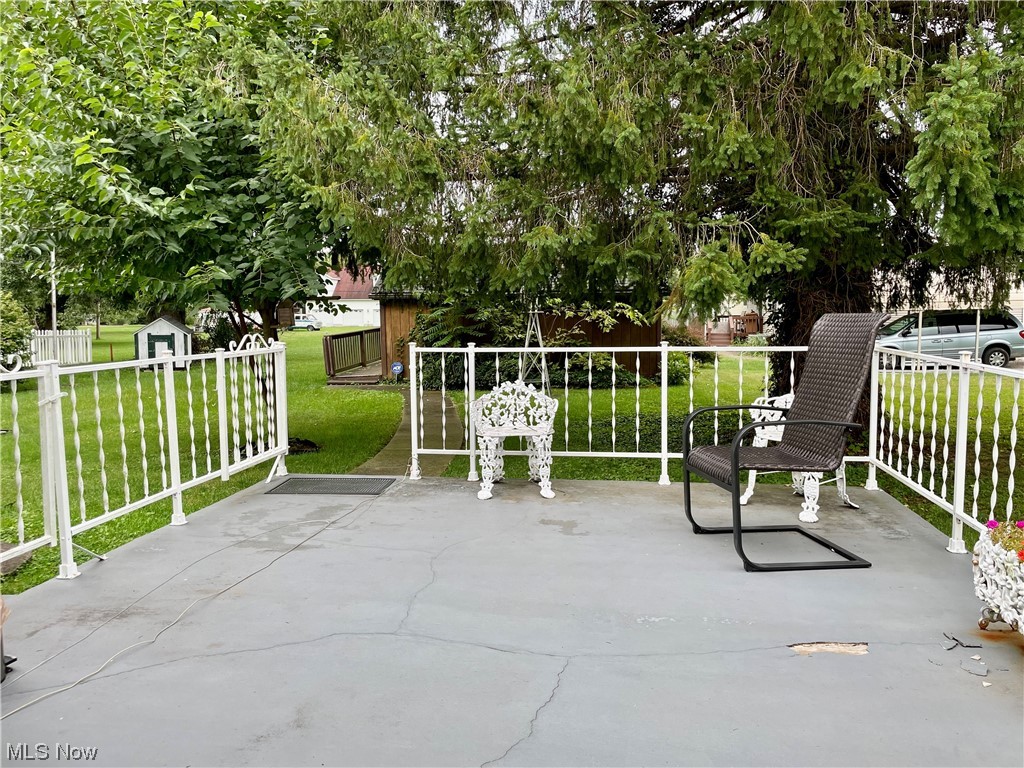 66119 Highway 124 Reedsville, OH 45772 - Photo 21 of 29 View of patio / terrace featuring a storage unit