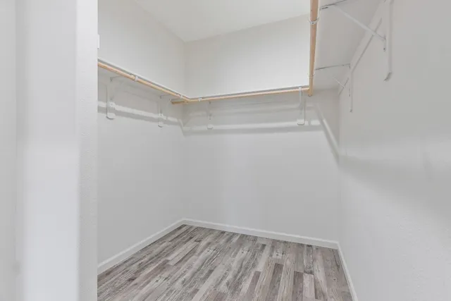 a view of an empty walk in closet