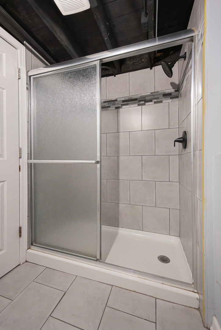 464 Prospect Boulevard Elgin, IL 60120 - Photo 12 of 17 a bathroom with a shower