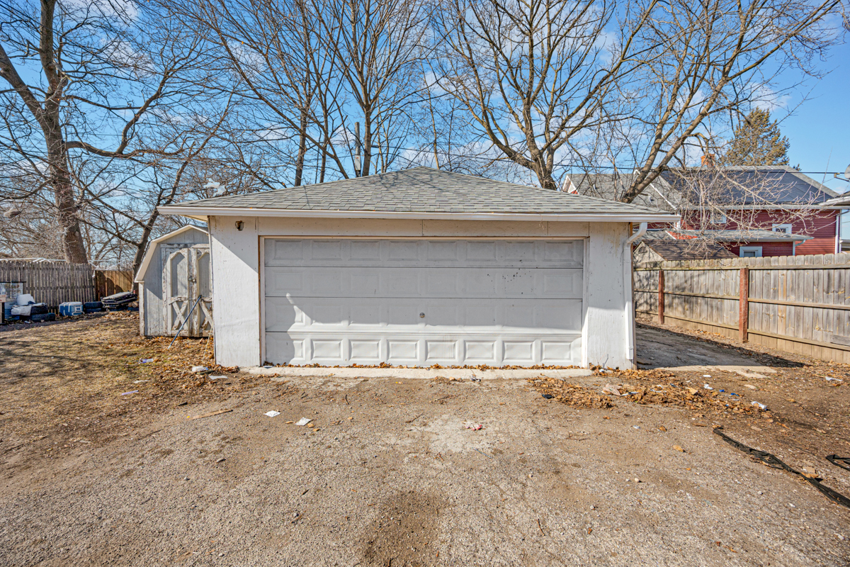 464 Prospect Boulevard Elgin, IL 60120 - Photo 16 of 17 a house with trees in front of it