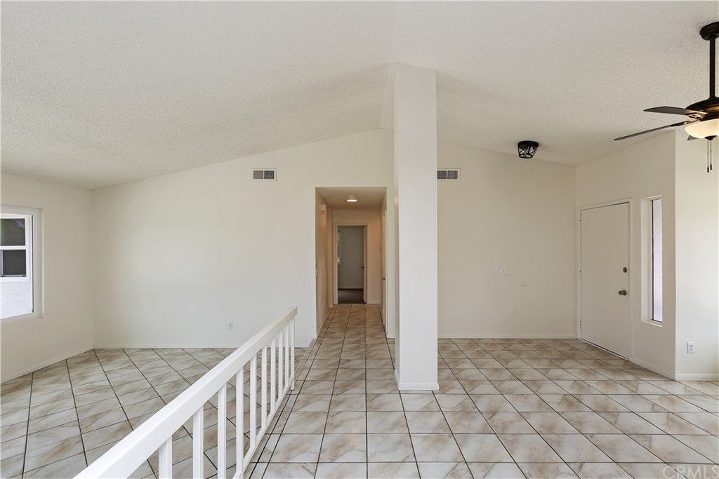 7571 Frazer Drive Riverside, CA 92509 - Photo 10 of 34 Living and Dining Room with View of Hallway