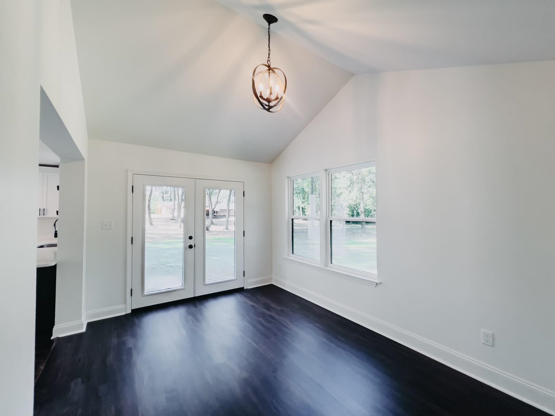 8515 Epperson Mill Road Millington, TN 38053 - Photo 11 of 32 Doorway featuring french doors, plenty of natural light, and dark wood-type flooring