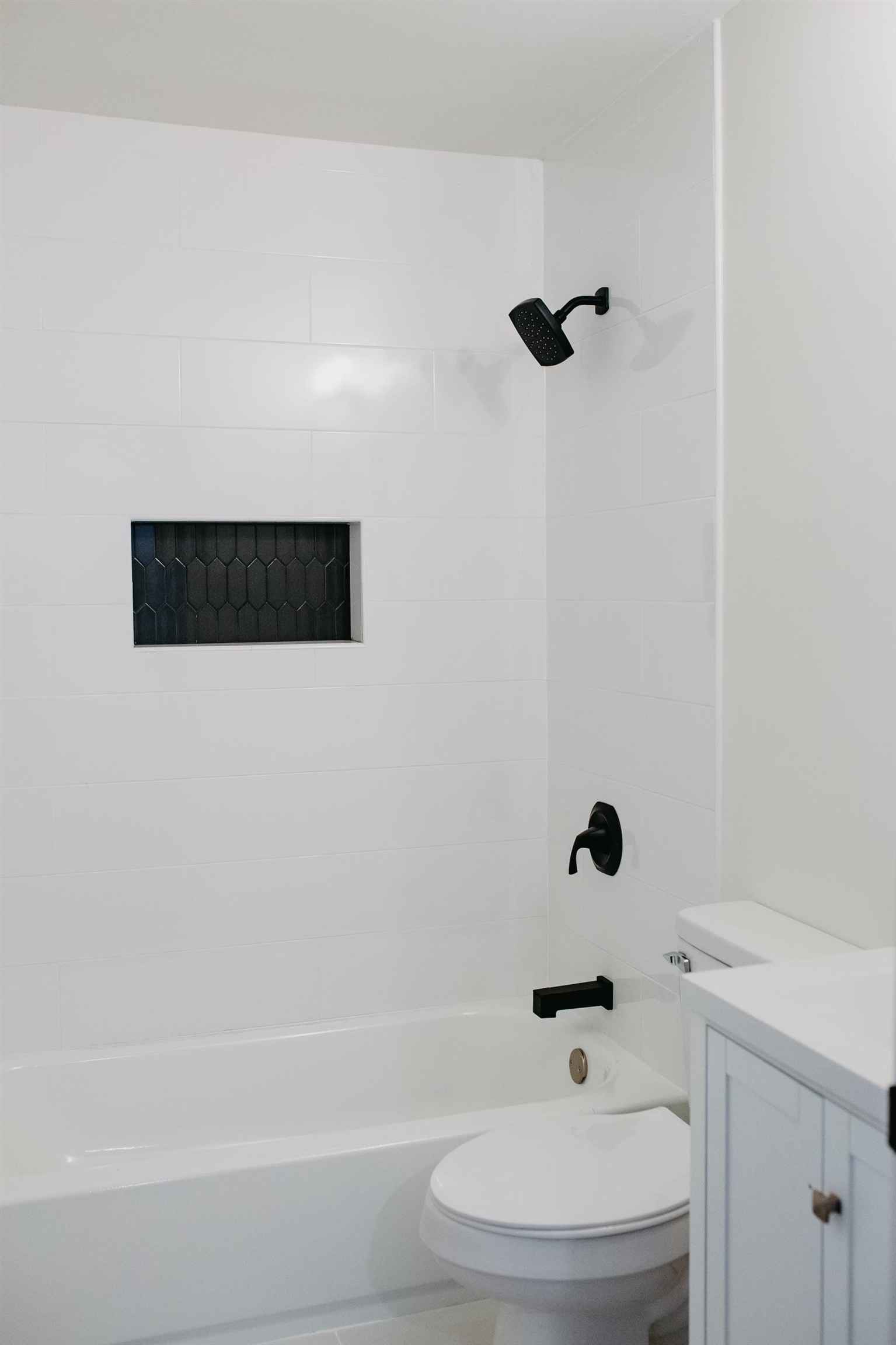 8515 Epperson Mill Road Millington, TN 38053 - Photo 20 of 32 Full bathroom featuring vanity, toilet, and tiled shower / bath