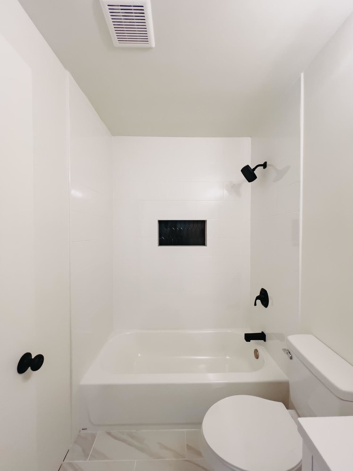 8515 Epperson Mill Road Millington, TN 38053 - Photo 24 of 32 Full bathroom with vanity, bathtub / shower combination, and toilet
