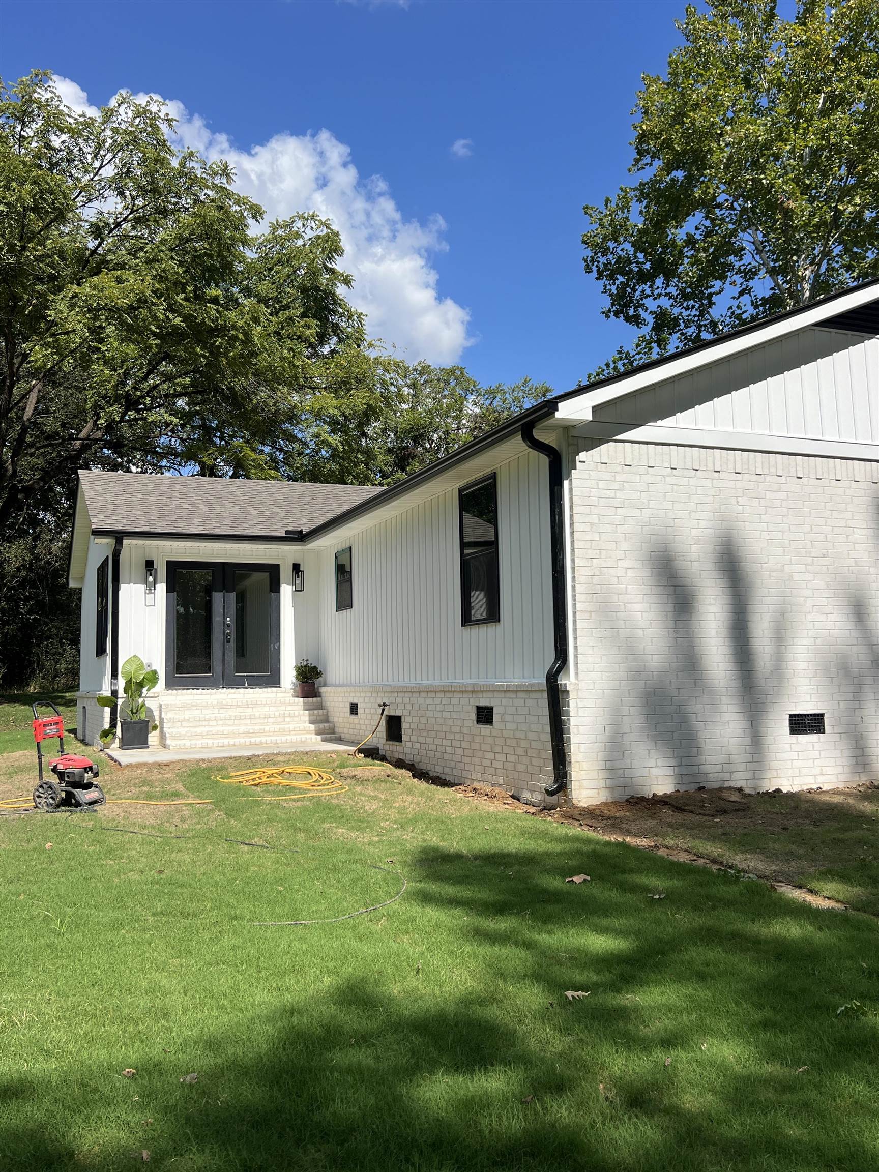 8515 Epperson Mill Road Millington, TN 38053 - Photo 27 of 32 Rear view of house featuring a yard