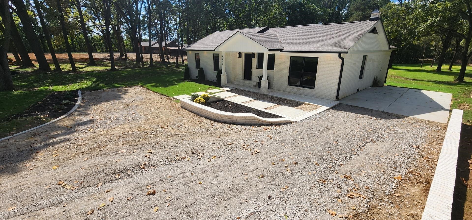 8515 Epperson Mill Road Millington, TN 38053 - Photo 28 of 32 Back of property featuring a yard