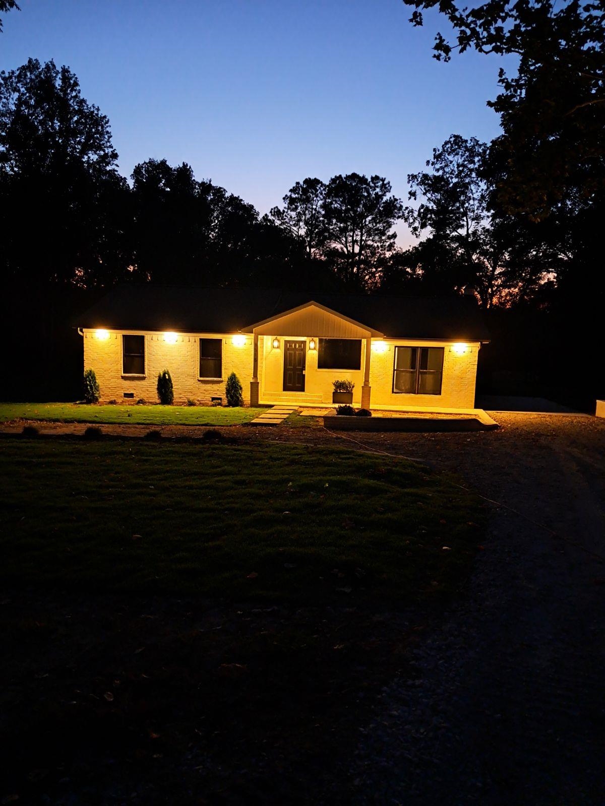 8515 Epperson Mill Road Millington, TN 38053 - Photo 32 of 32 Back house at dusk with a yard