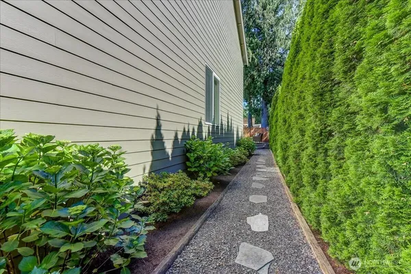 a view of front of house with a yard