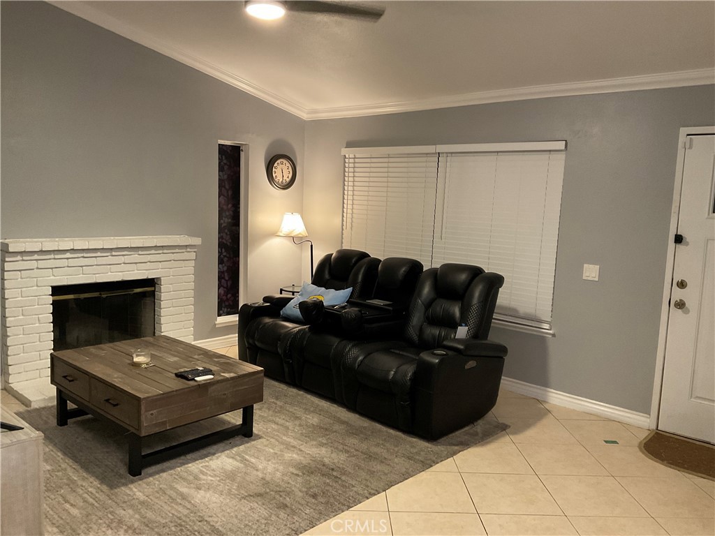 3370 Hollowood Court Riverside, CA 92503 - Photo 4 of 14 a living room with furniture and a fireplace