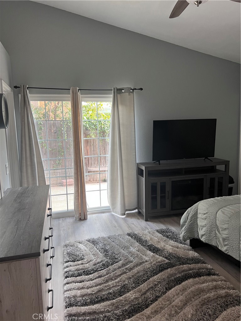 3370 Hollowood Court Riverside, CA 92503 - Photo 9 of 14 a bedroom with a bed and a flat screen tv