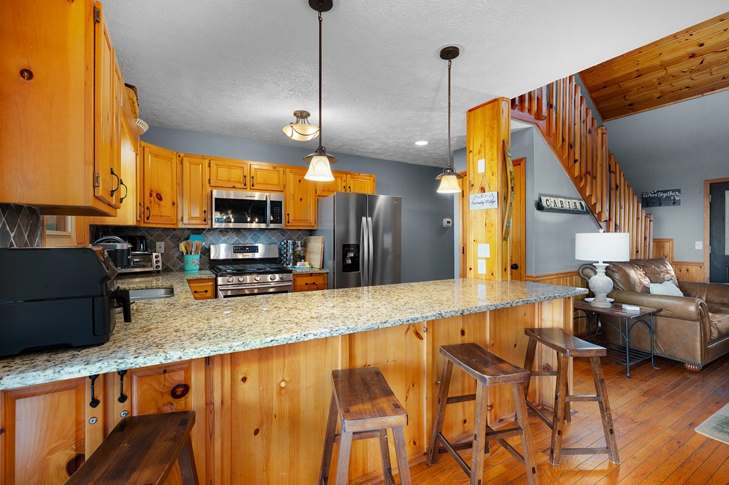 170 Walnut Ridge Ellijay, GA 30536 - Photo 23 of 65 Spacious Kitchen with Breakfast Bar