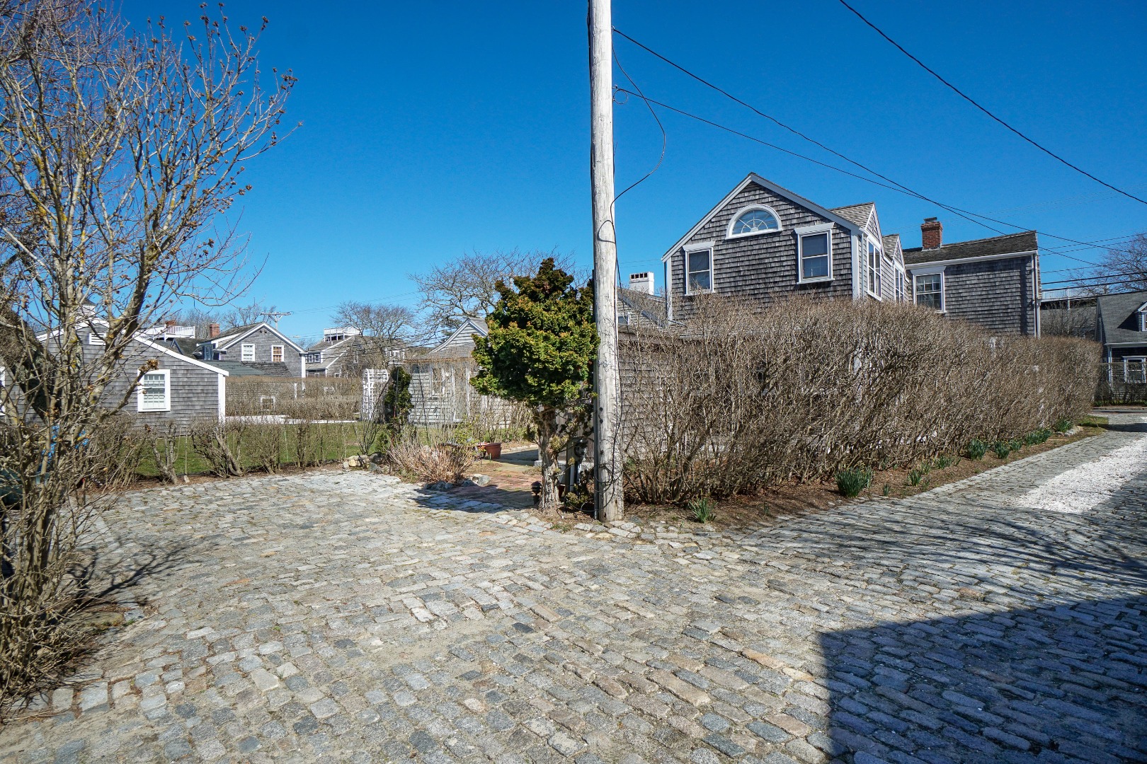 36 Cliff Road Nantucket, MA 02554 - Photo 15 of 15 a view of a house with a yard