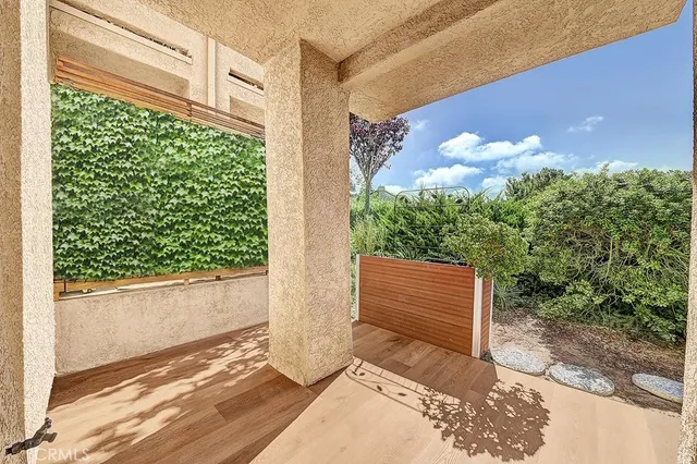 a view of a back yard from a room