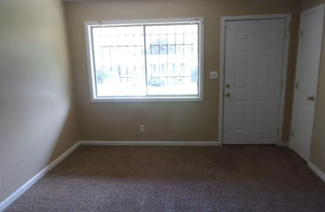 an empty room with a window