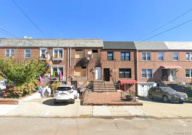 a front view of a house with a patio