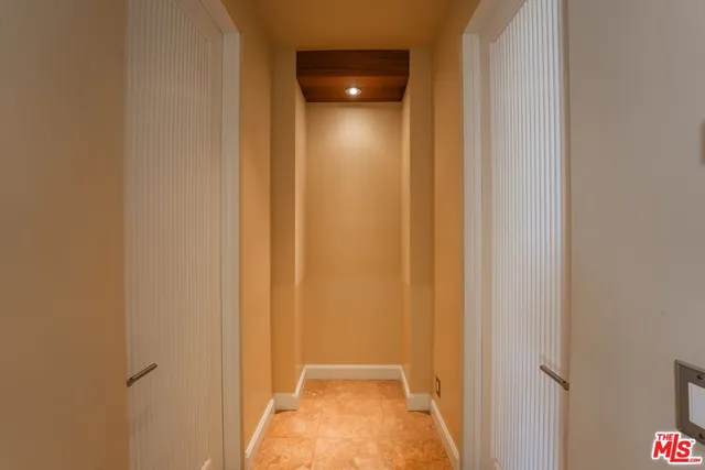 a large bathroom with a large tub and sink