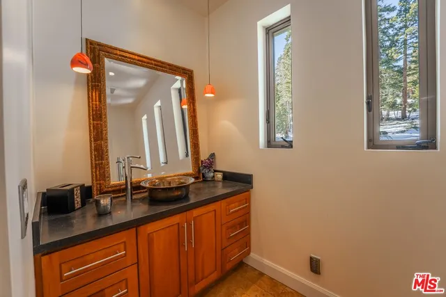 a bath tub sitting next to a window