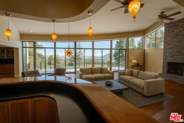 a spacious bathroom with a tub sink and mirror