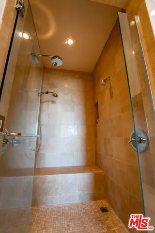 a bathroom with sink and mirror