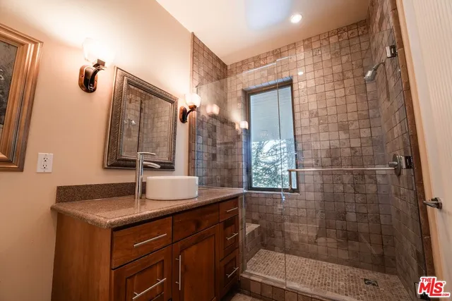 a kitchen with counter top space and stainless steel appliances