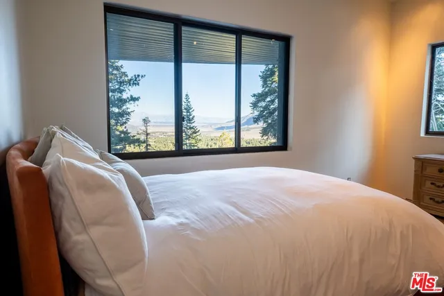 a kitchen with granite countertop a stove and a sink