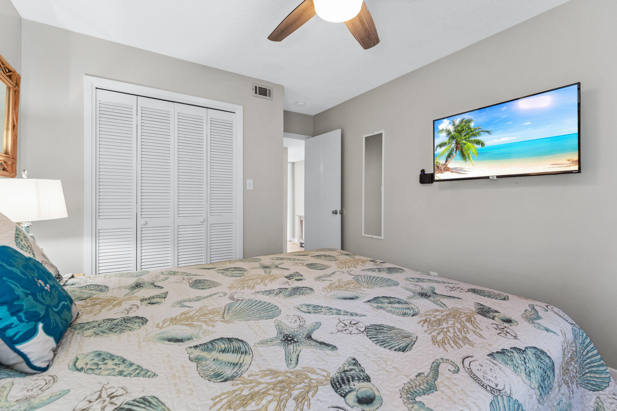 488 North Driftwood Bay, Unit 97F Miramar Beach, FL 32550 - Photo 18 of 31 a bedroom with a bed and a painting on the wall