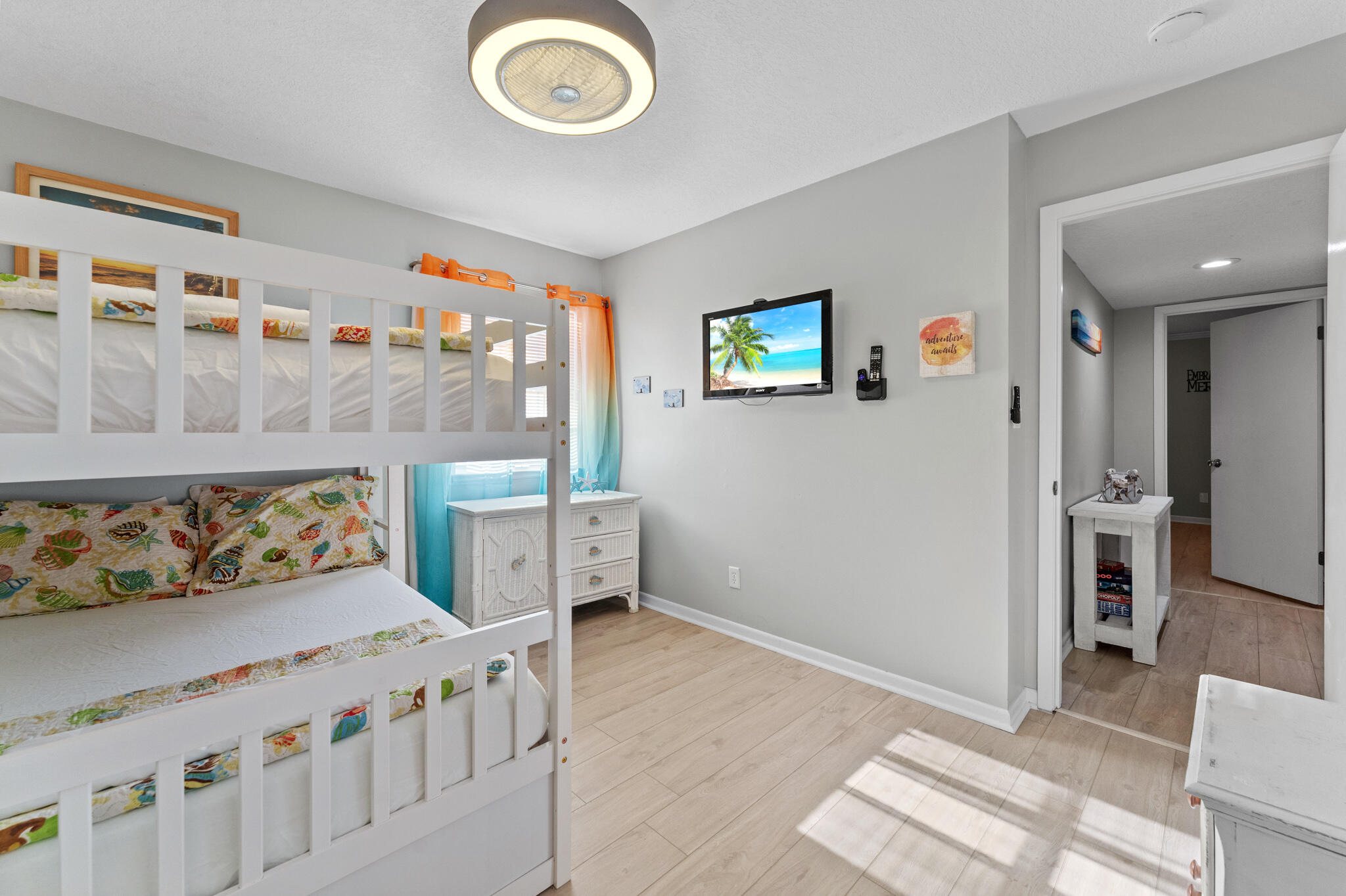 488 North Driftwood Bay, Unit 97F Miramar Beach, FL 32550 - Photo 20 of 31 a bedroom with furniture and a baby crib