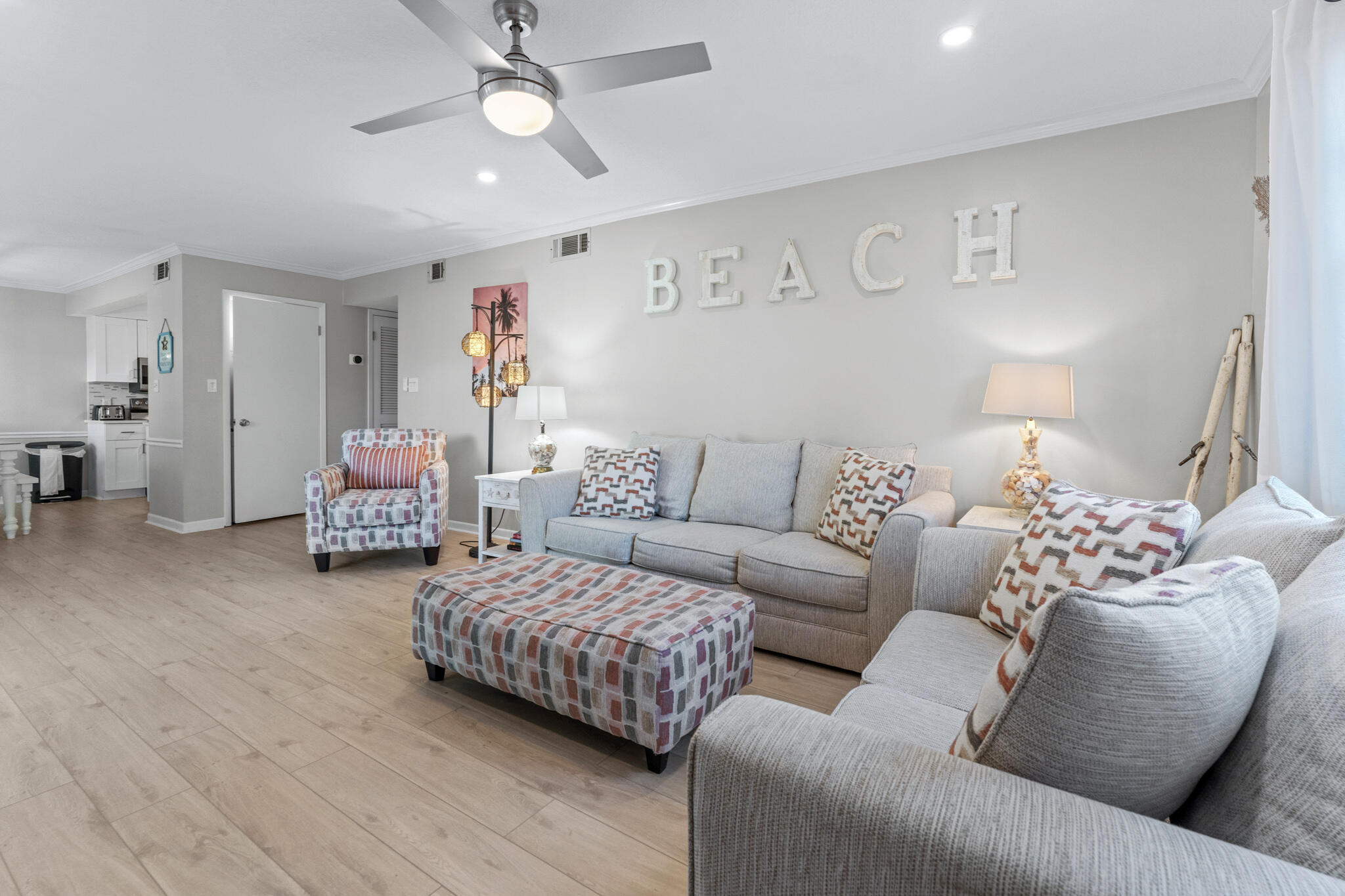 488 North Driftwood Bay, Unit 97F Miramar Beach, FL 32550 - Photo 2 of 31 a living room with furniture and a couch