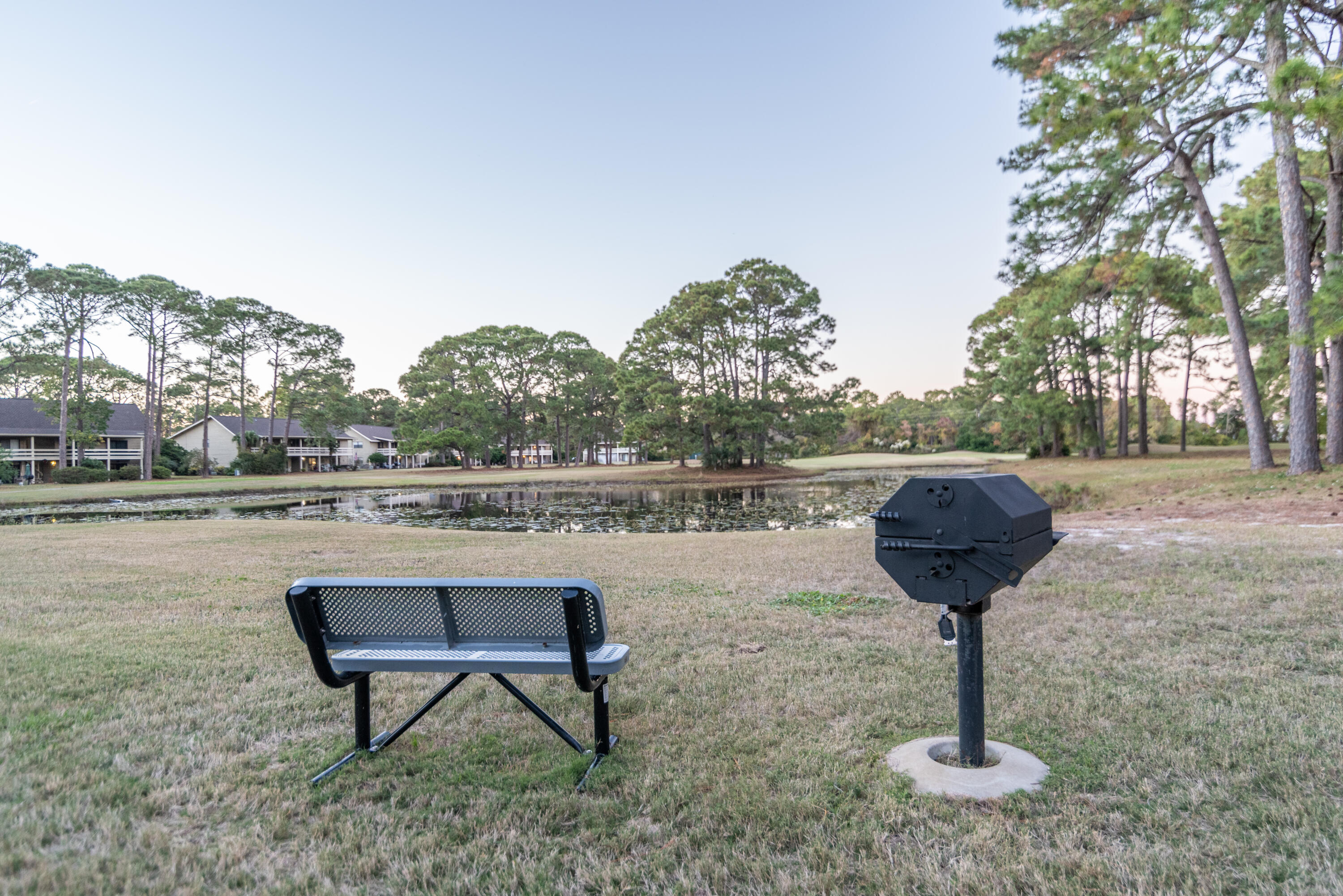 488 North Driftwood Bay, Unit 97F Miramar Beach, FL 32550 - Photo 28 of 31 a view of a lake with a yard
