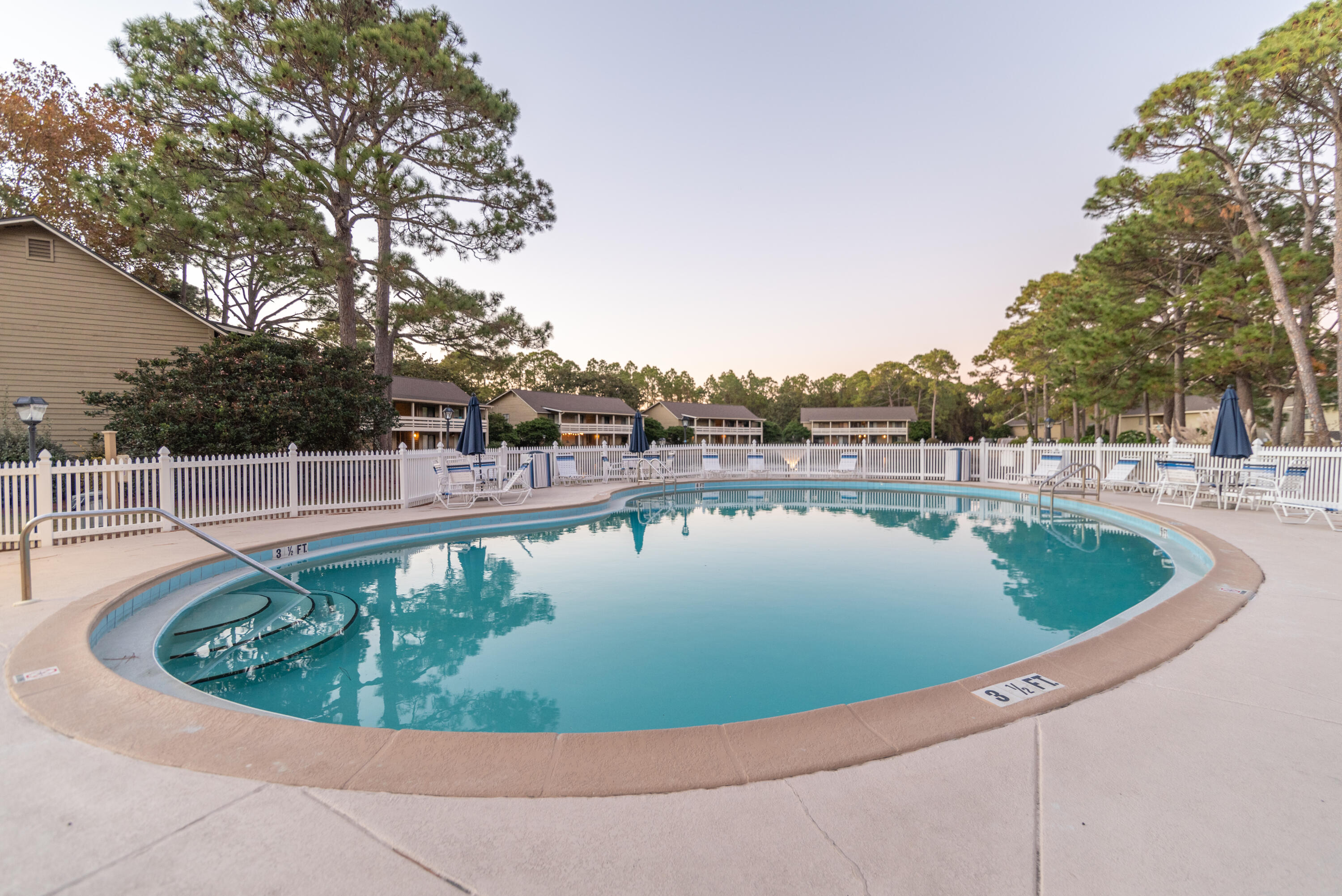 488 North Driftwood Bay, Unit 97F Miramar Beach, FL 32550 - Photo 29 of 31 a view of a swimming pool with outdoor seating
