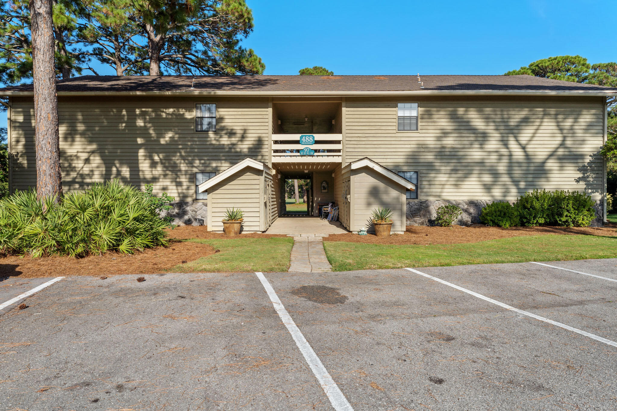 488 North Driftwood Bay, Unit 97F Miramar Beach, FL 32550 - Photo 4 of 31 a house view with a garden space