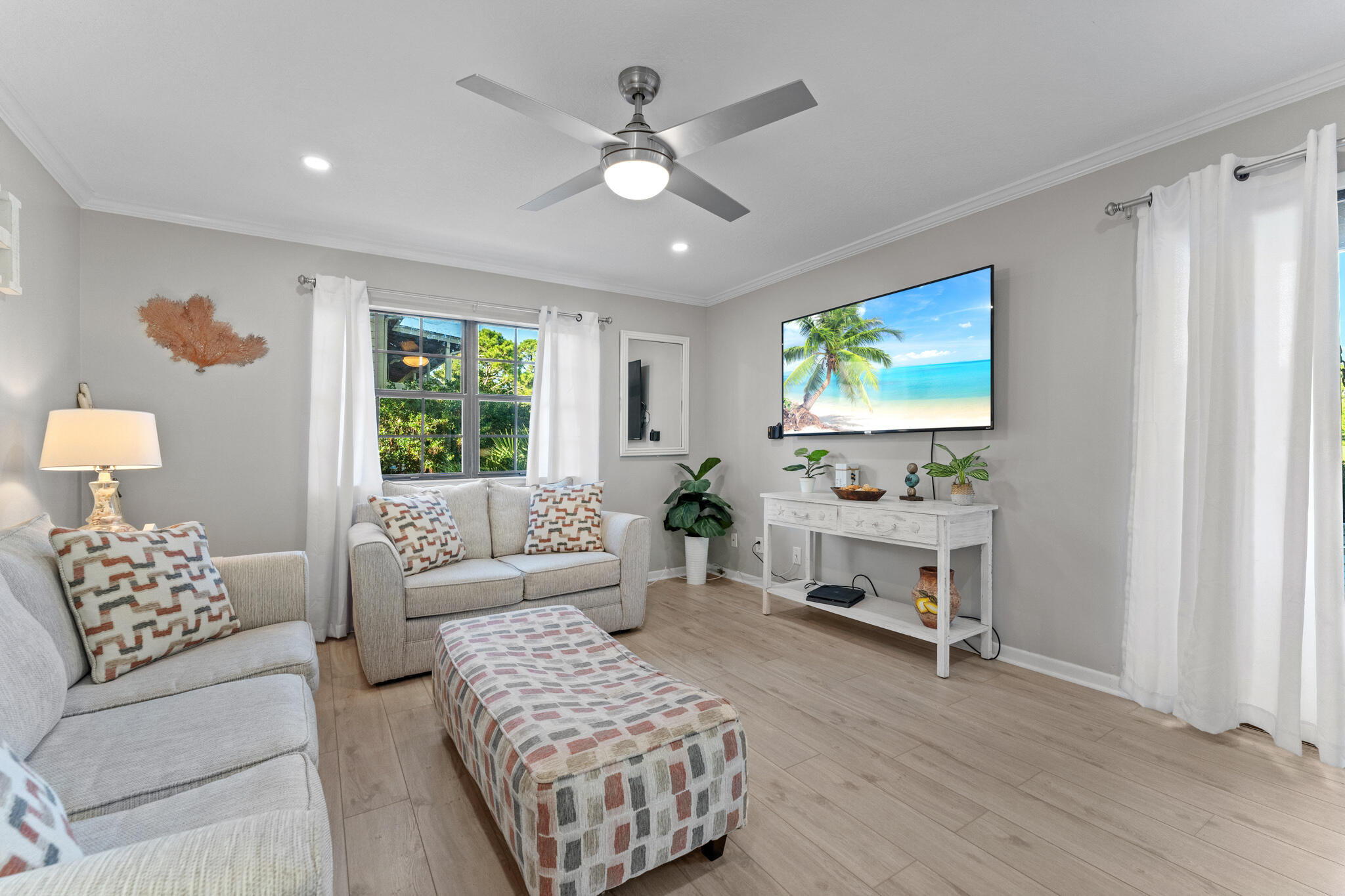 488 North Driftwood Bay, Unit 97F Miramar Beach, FL 32550 - Photo 8 of 31 a living room with furniture and a large window