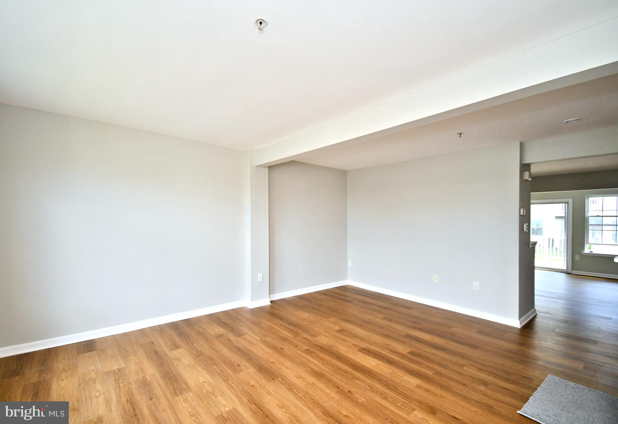 3306 Orchard View Road Reading, PA 19606 - Photo 2 of 16 a view of empty room with wooden floor