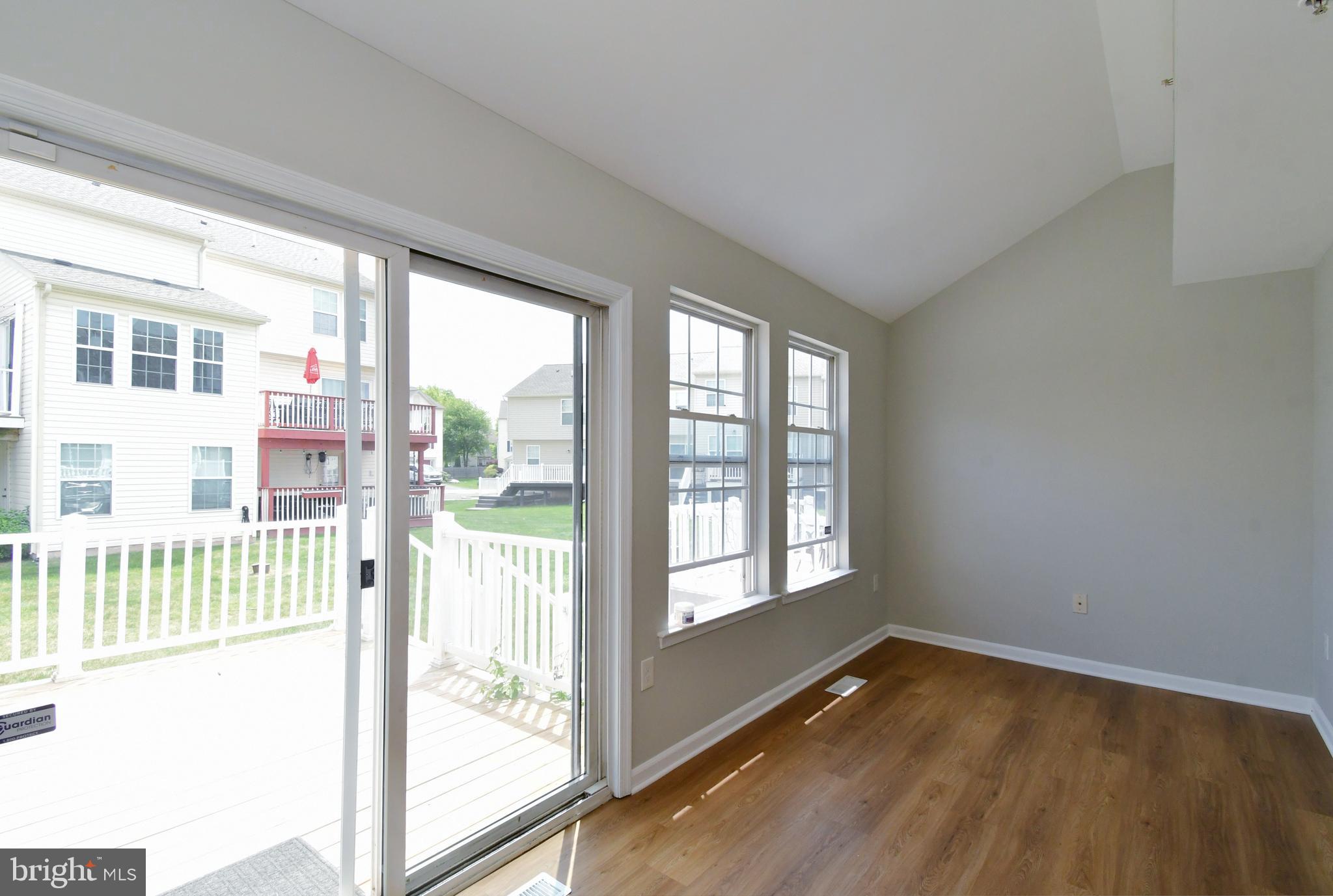 3306 Orchard View Road Reading, PA 19606 - Photo 5 of 16 a view of an empty room with wooden floor and a window