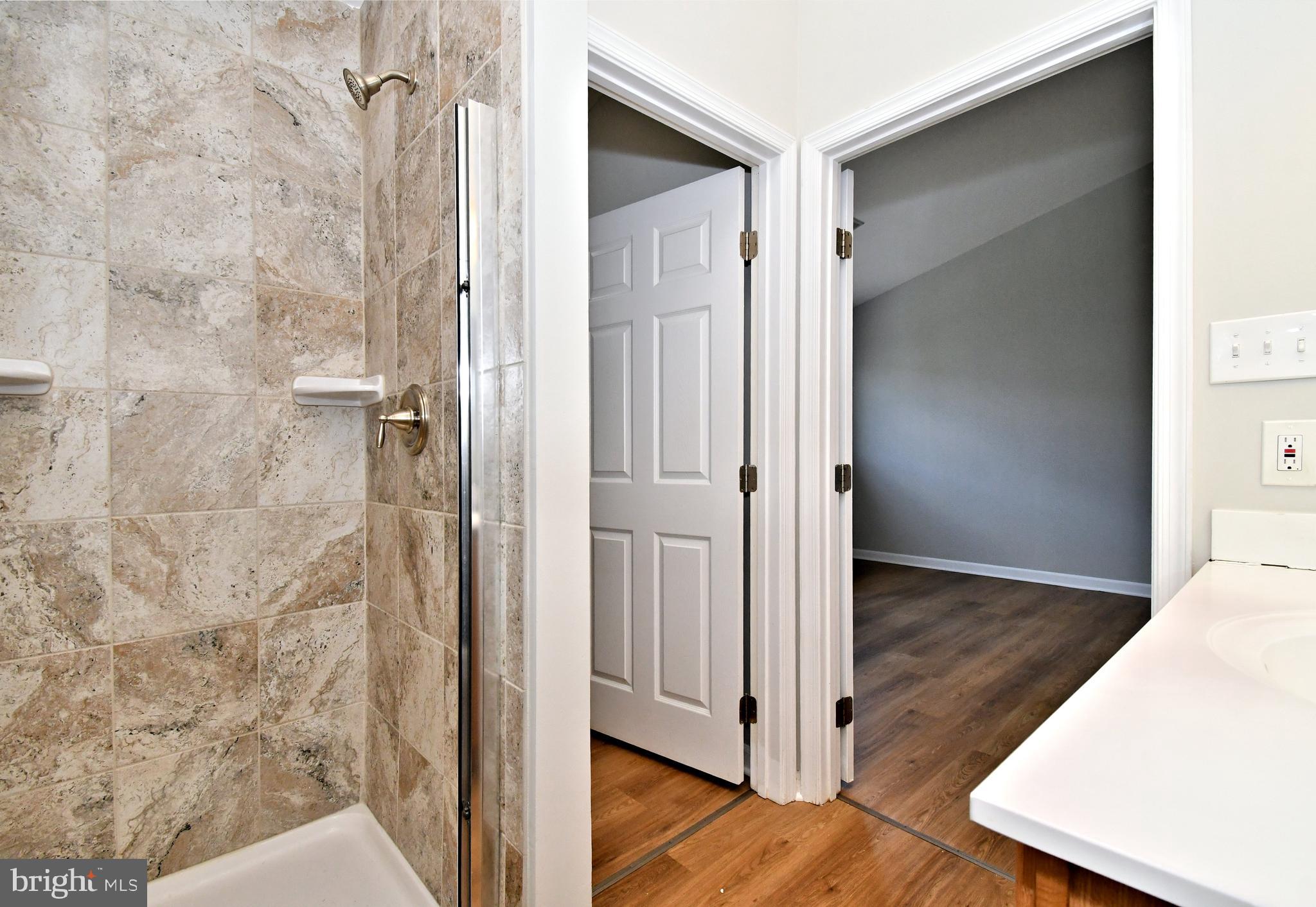 3306 Orchard View Road Reading, PA 19606 - Photo 10 of 16 a view of a bathroom from a hallway