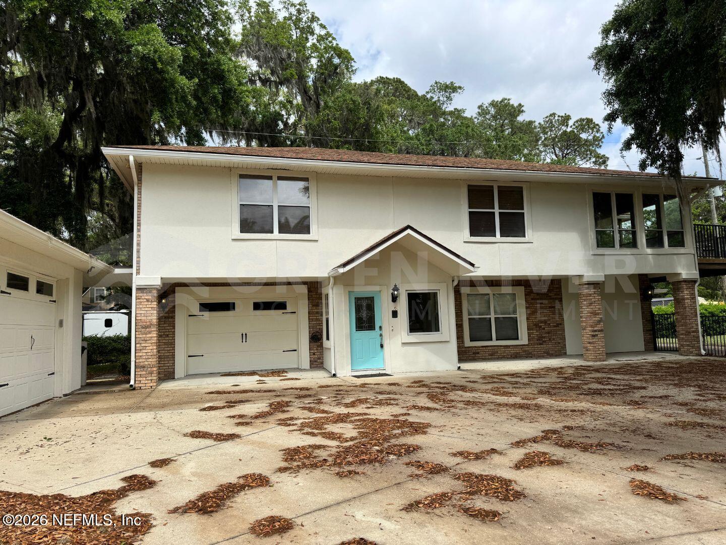174 Eventide Drive Fleming Island, FL 32003 - Photo 2 of 60 a view of a house with a backyard space