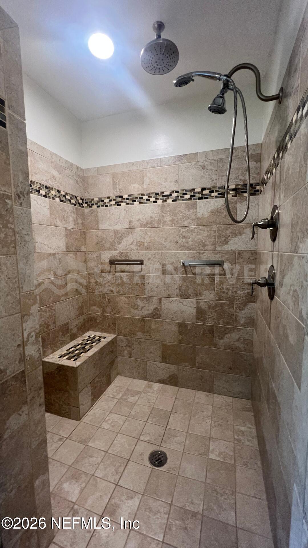174 Eventide Drive Fleming Island, FL 32003 - Photo 53 of 60 a bathroom with a shower