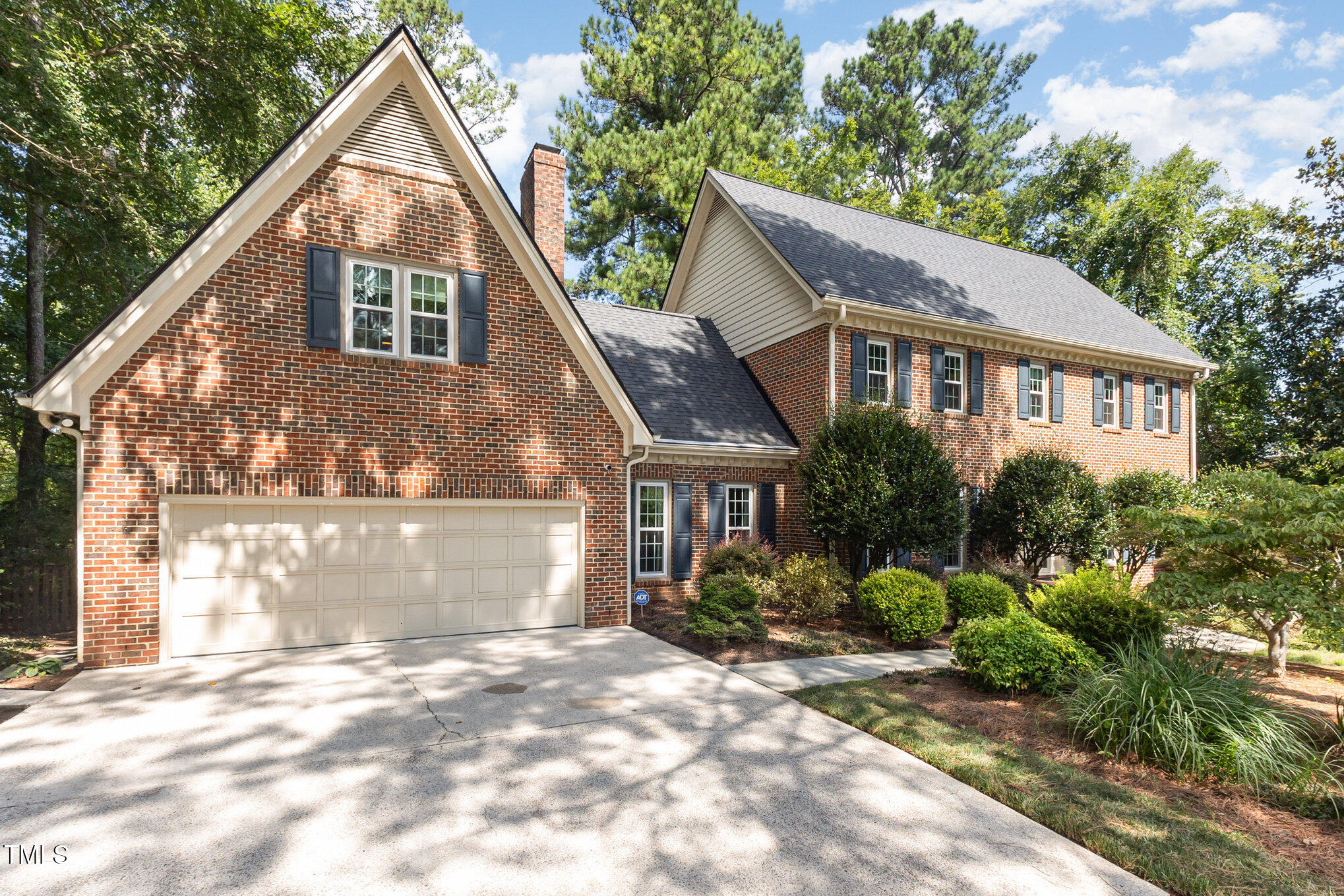 6909 Brook Ridge Court Raleigh, NC 27615 - Photo 54 of 60 Garage & front of house